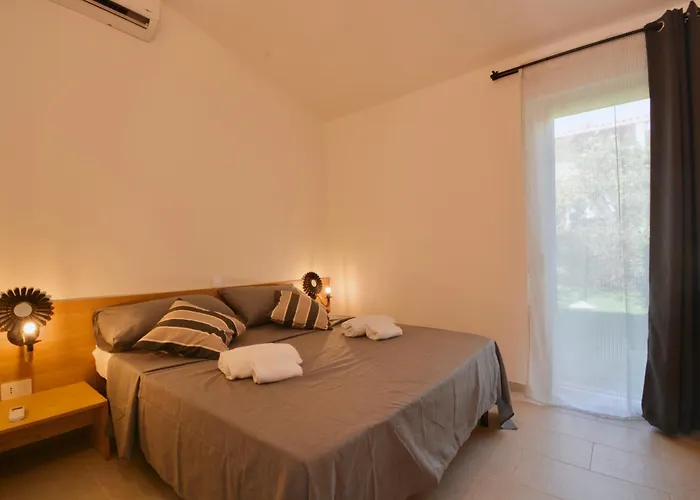 In Just 450 Meters From The Beach, With Air Conditioning And Outdoor Private Area Apart Otel Costa Rei
